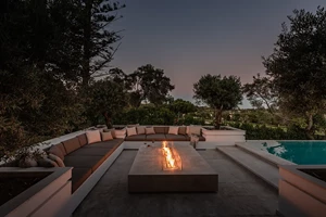 a poolside table at night