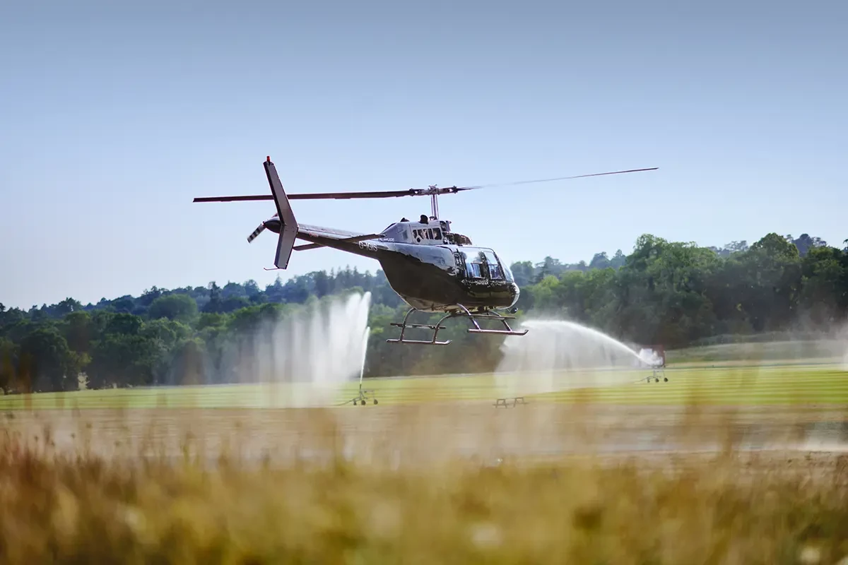A helicopter landing at Coworth Park